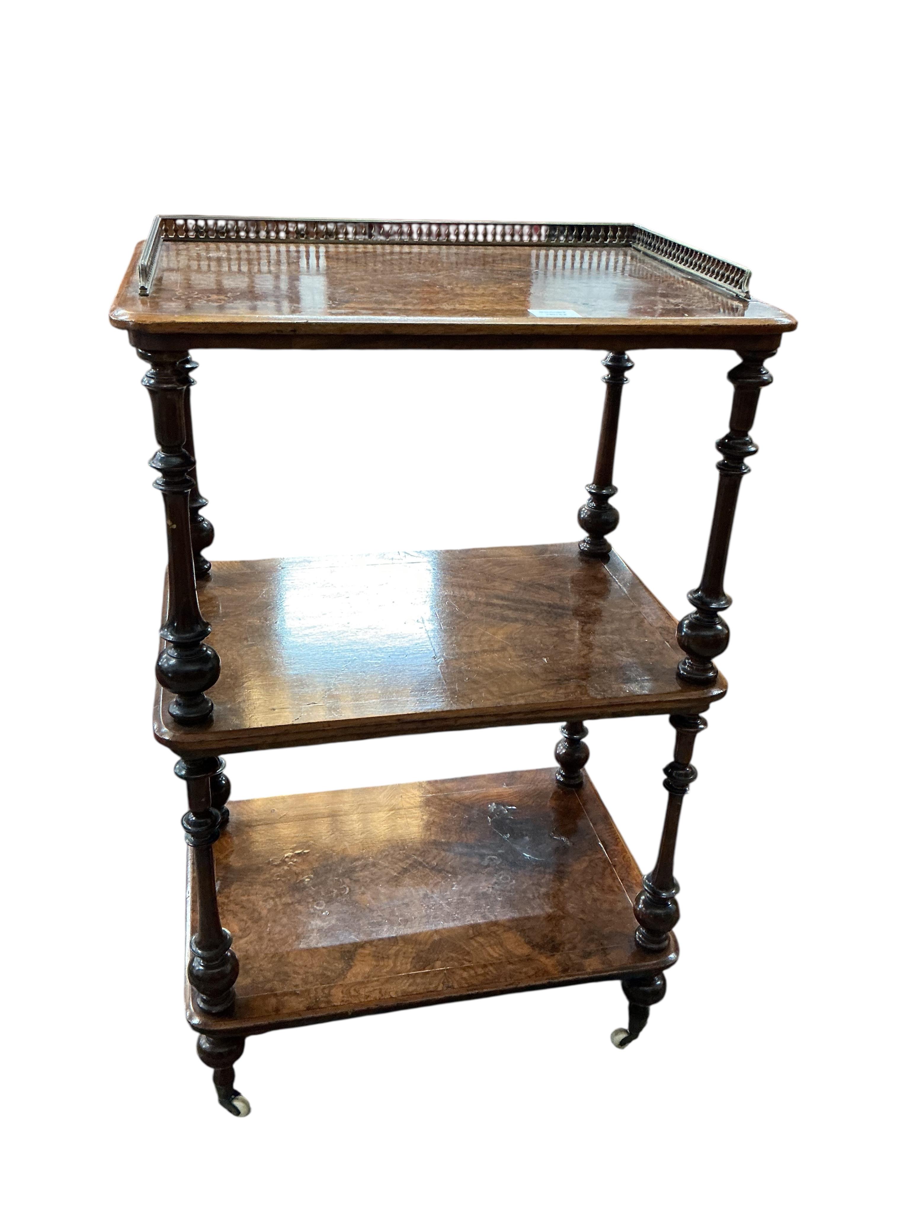 A Victorian walnut three tier whatnot, width 60cm, depth 40cm, height 95cm